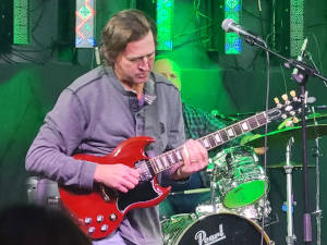 Coop rockin' out on an electric guitar lead