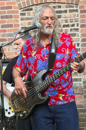 Ron Lasken playing bass guitar.